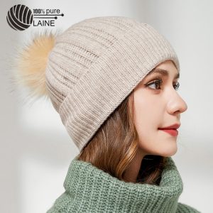 Bonnet en laine pompon fourrure véritable