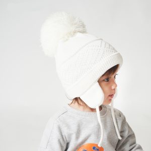 Bonnet gros pompon tricoté en coton avec oreillettes pour bébé